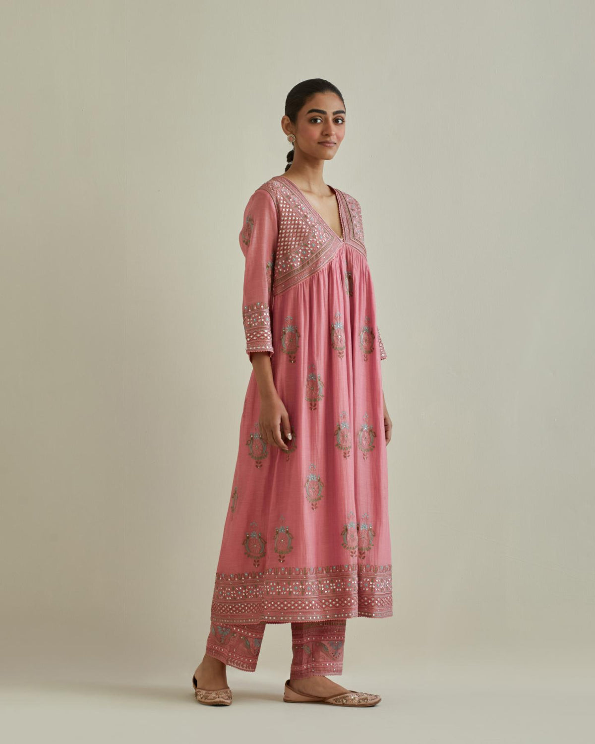 Pink cotton chanderi embroidered kurta dress set with V neck, yoke and fine gathers at empire line.