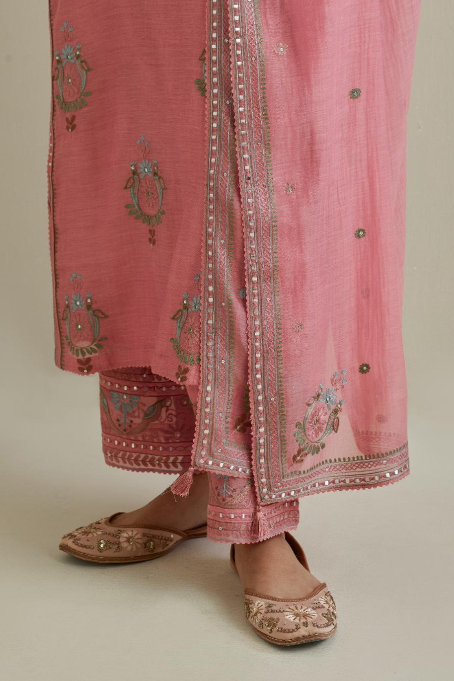 Pink cotton chanderi dupatta with delicate silk thread embroidery, highlighted with braids, mirrors and sequins work.