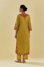 Yellow tissue chanderi straight kurta set with delicate hand cut silk flower embroidery, highlighted with gold sequins and beads.