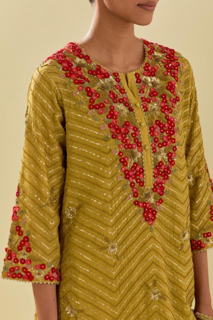Yellow tissue chanderi straight kurta set with delicate hand cut silk flower embroidery, highlighted with gold sequins and beads.