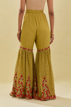 Yellow tissue chanderi farshi with delicate hand cut silk flower embroidery, highlighted with gold sequins and beads.