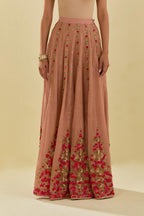 Pink tissue chanderi lehenga with all-over delicate hand cut silk flower embroidery, highlighted with gold sequins.