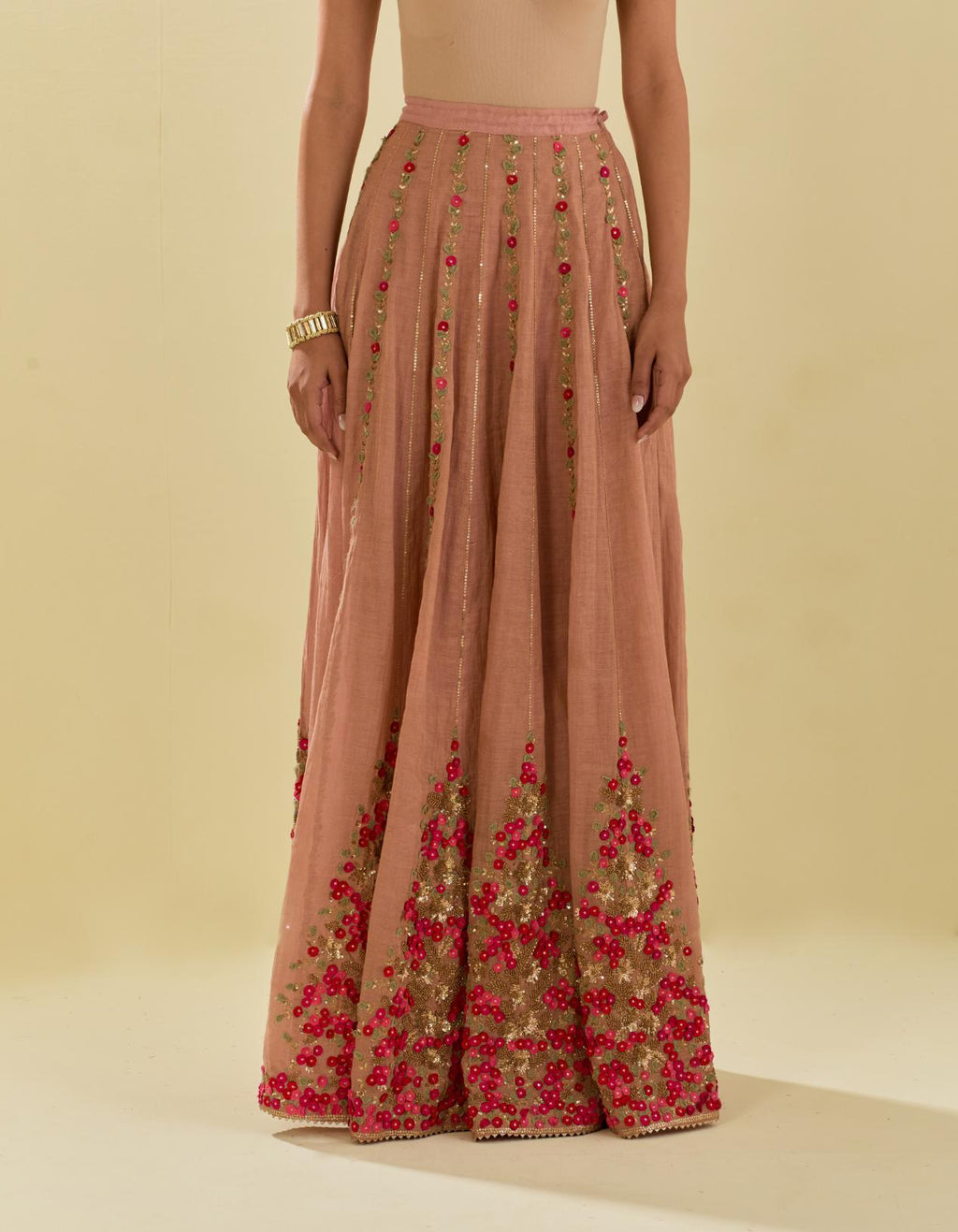 Pink tissue chanderi short top set with delicate hand cut silk flower embroidery, highlighted with gold sequins and beads.