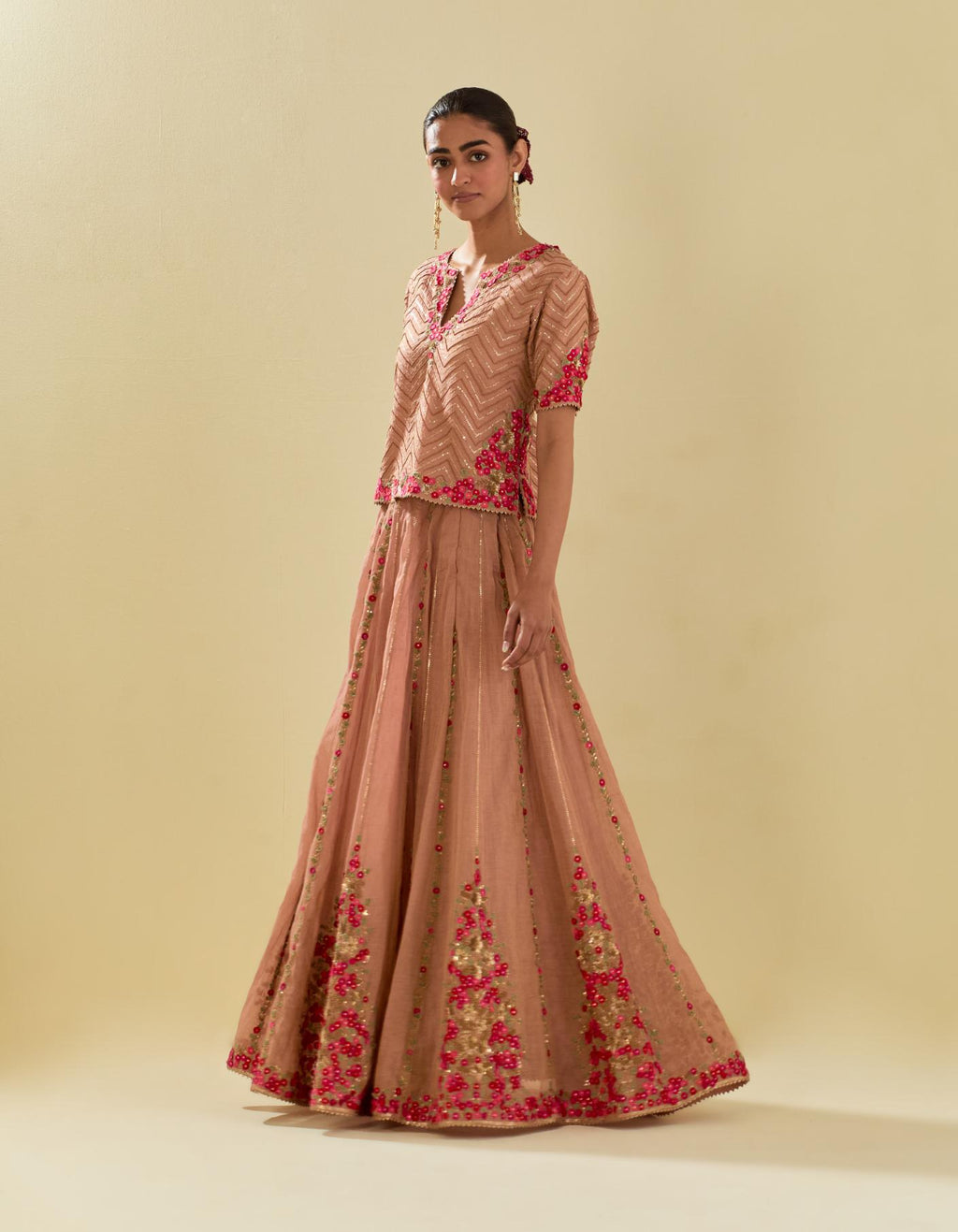 Pink tissue chanderi short top set with delicate hand cut silk flower embroidery, highlighted with gold sequins and beads.