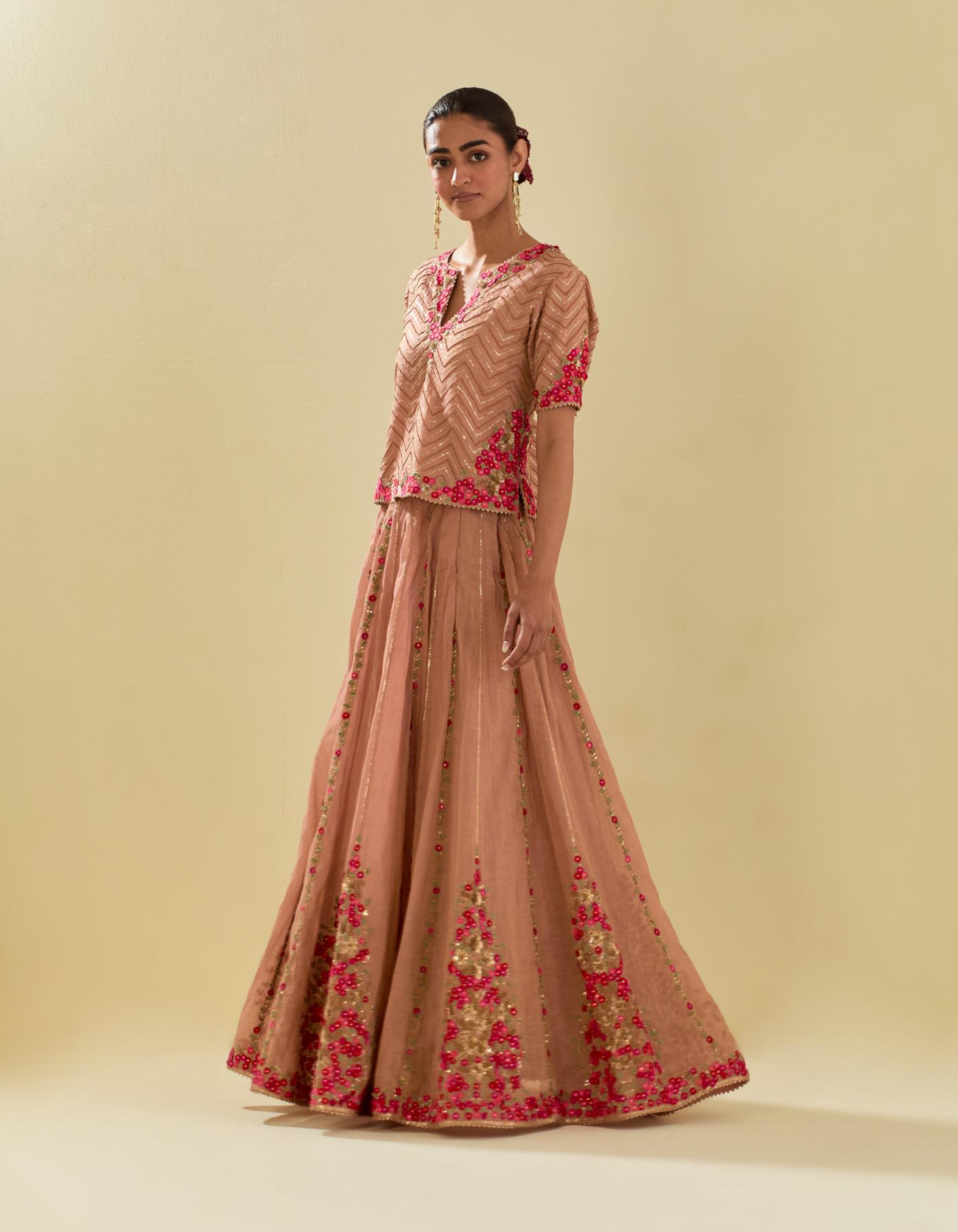Pink tissue chanderi short top set with delicate hand cut silk flower embroidery, highlighted with gold sequins and beads.