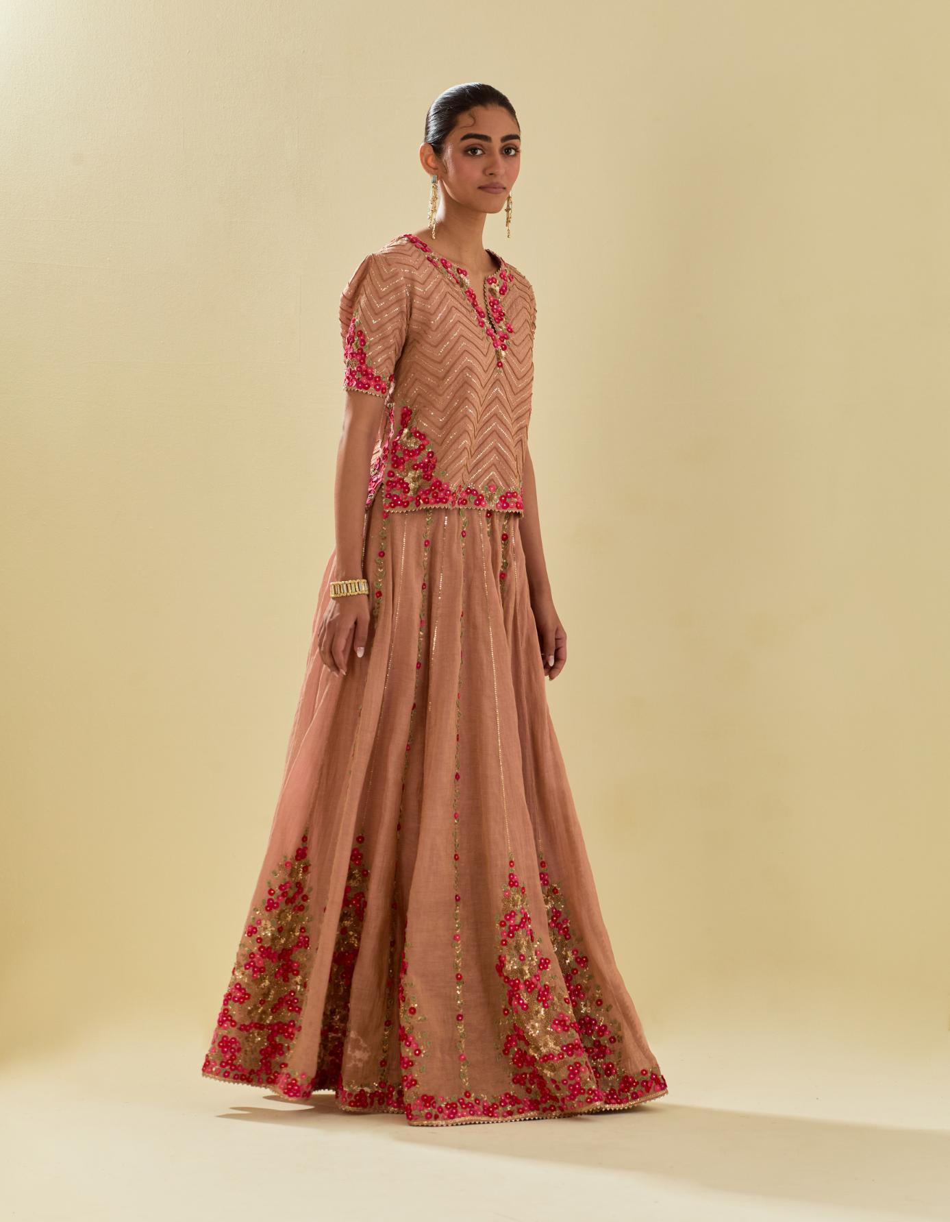 Pink tissue chanderi short top set with delicate hand cut silk flower embroidery, highlighted with gold sequins and beads.