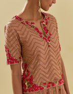Pink tissue chanderi short top set with delicate hand cut silk flower embroidery, highlighted with gold sequins and beads.