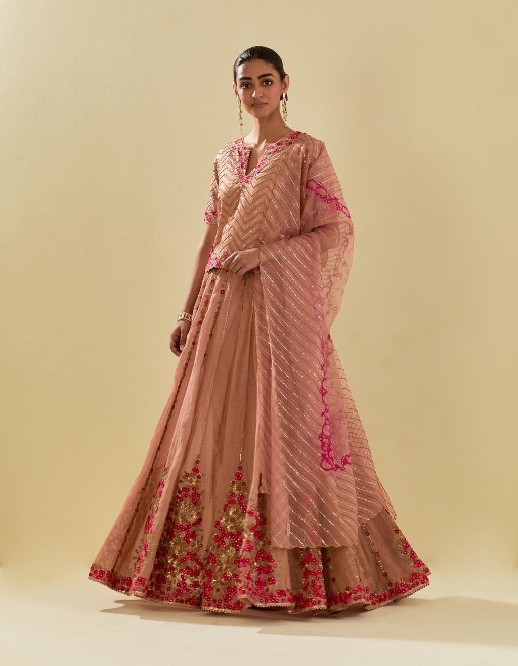 Pink silk organza dupatta with delicate gold zari embroidery & silk applique work, highlighted with gold sequins and beads.