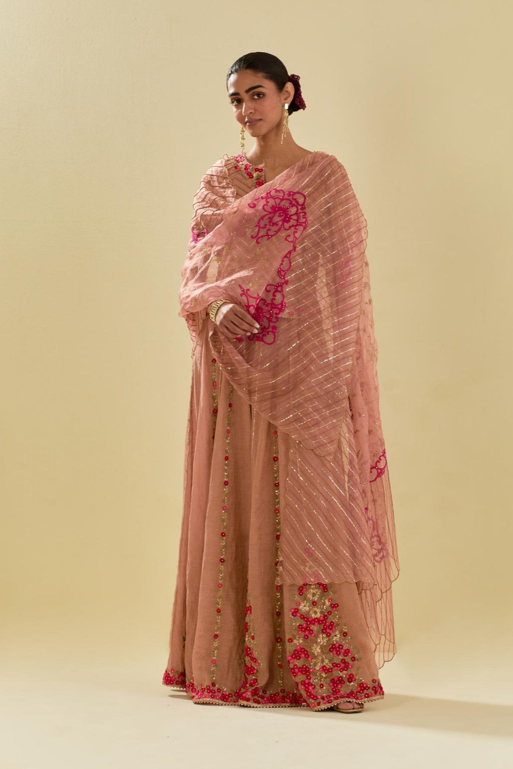 Pink silk organza dupatta with delicate gold zari embroidery & silk applique work, highlighted with gold sequins and beads.