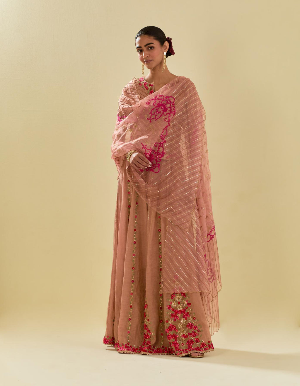 Pink tissue chanderi short top set with delicate hand cut silk flower embroidery, highlighted with gold sequins and beads.