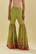 Green tissue chanderi farshi with delicate hand cut silk flower embroidery, highlighted with gold sequins and beads.