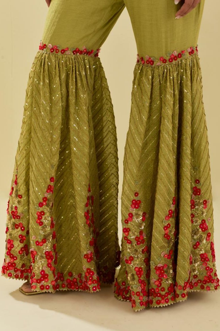 Green tissue chanderi farshi with delicate hand cut silk flower embroidery, highlighted with gold sequins and beads.
