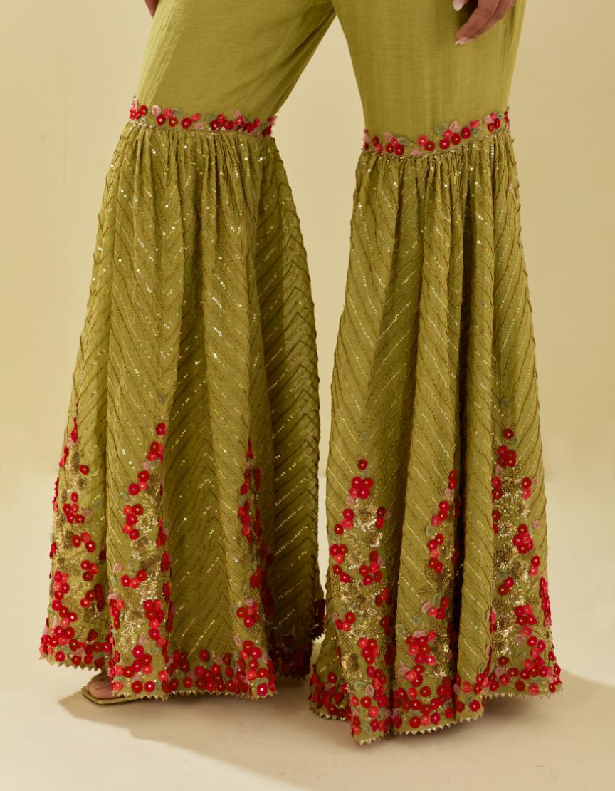 Green tissue chanderi farshi with delicate hand cut silk flower embroidery, highlighted with gold sequins and beads.