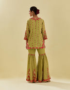 Green tissue chanderi short kurta set with round neck and slit in the front and all-over hand cut silk flower embroidery.