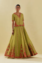 Green tissue chanderi short top set with delicate hand cut silk flower embroidery, highlighted with gold sequins and beads.