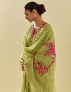 Green tissue chanderi short top set with delicate hand cut silk flower embroidery, highlighted with gold sequins and beads.