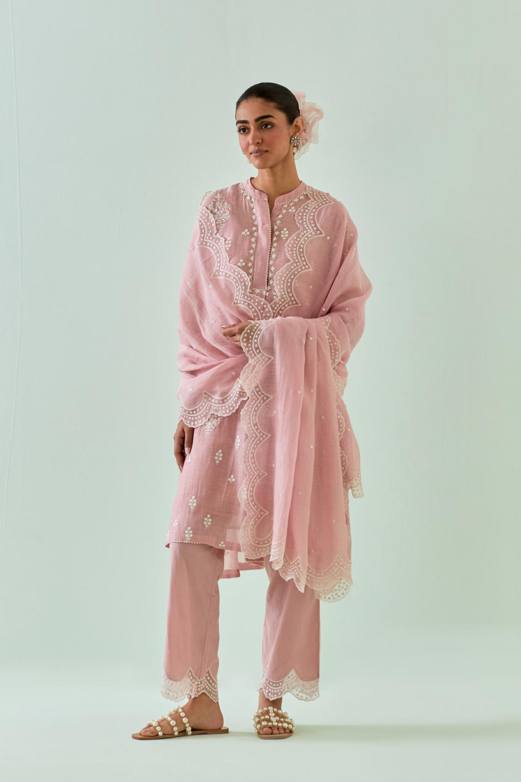 Pink short shirt-kurta set with all-over off white Dori embroidery and highlighted with delicate beaded work.
