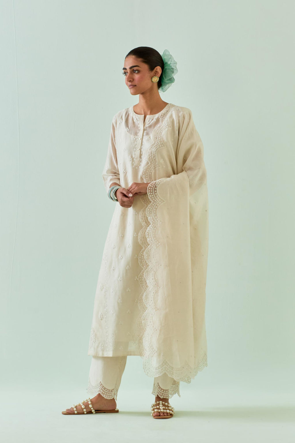 off white straight kurta set with all-over off white Dori embroidery, highlighted with delicate beaded work and embroidery detail at side panel joint seams.