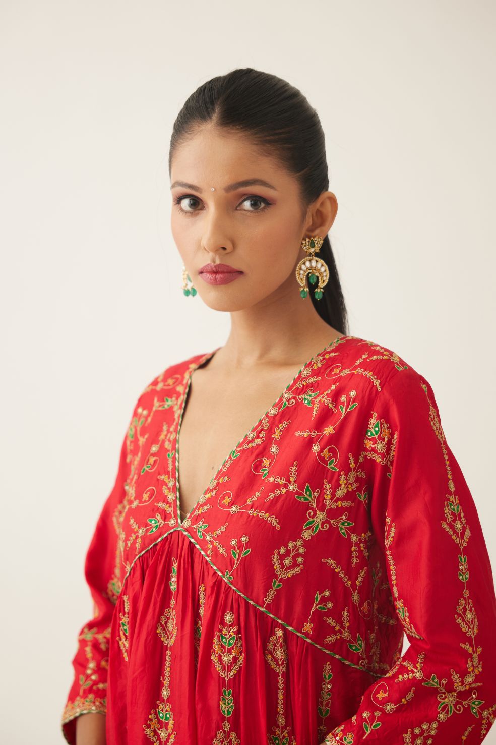 Red silk embroidered kurta dress set with fine gathers at empire line.