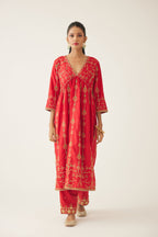Red silk embroidered kurta dress set with fine gathers at empire line.