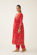 Red silk embroidered kurta dress set with fine gathers at empire line.