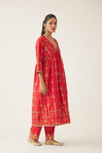 Red silk embroidered kurta dress set with fine gathers at empire line.