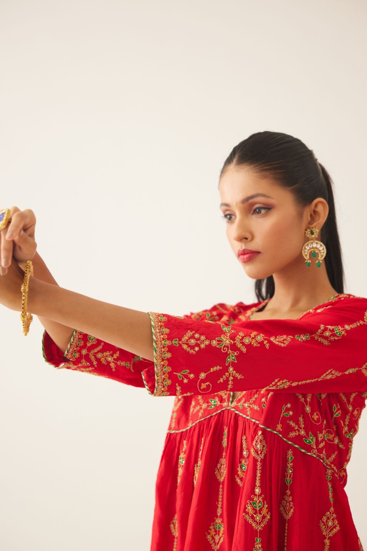 Red silk embroidered kurta dress set with fine gathers at empire line.