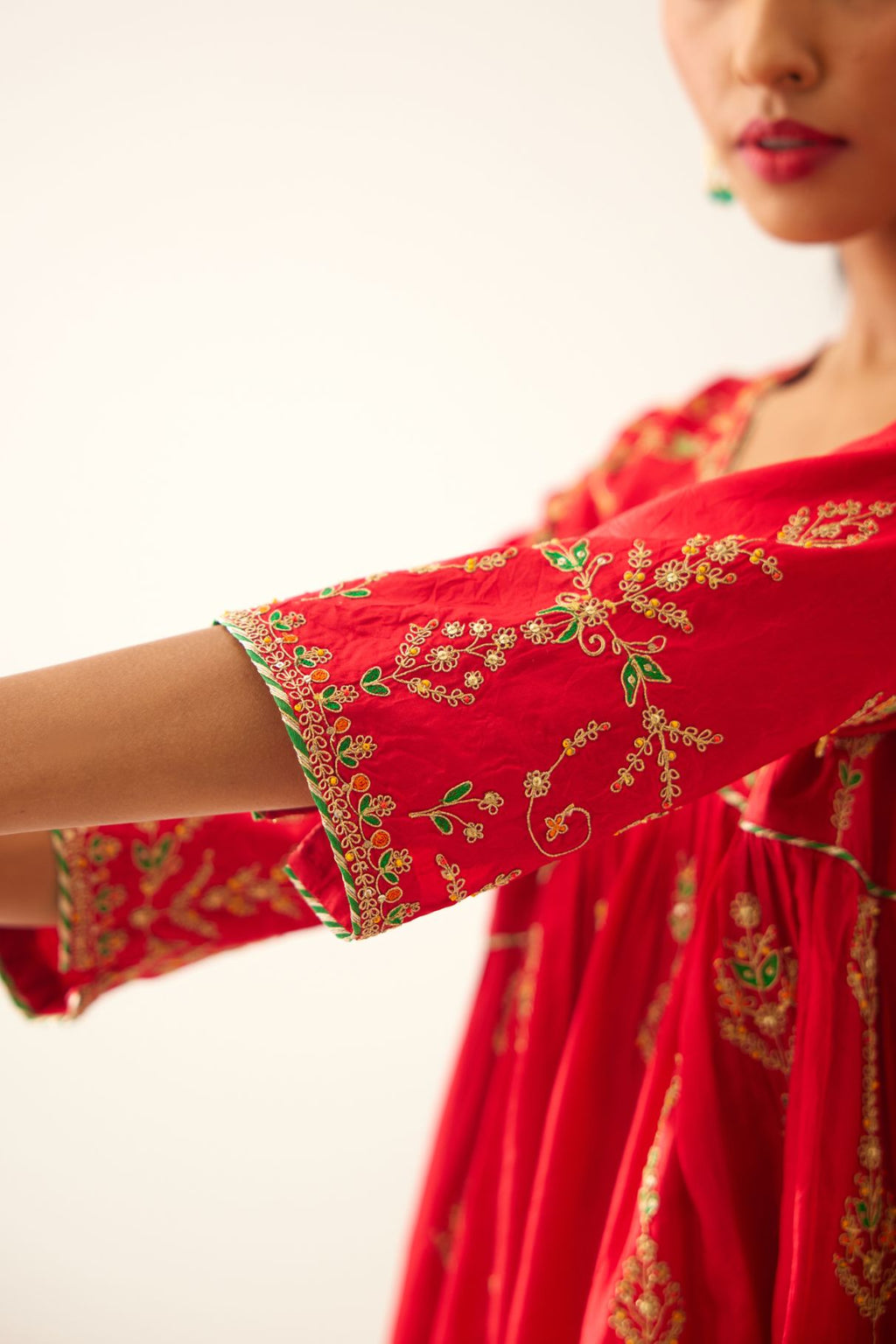 Red silk embroidered kurta dress set with fine gathers at empire line.