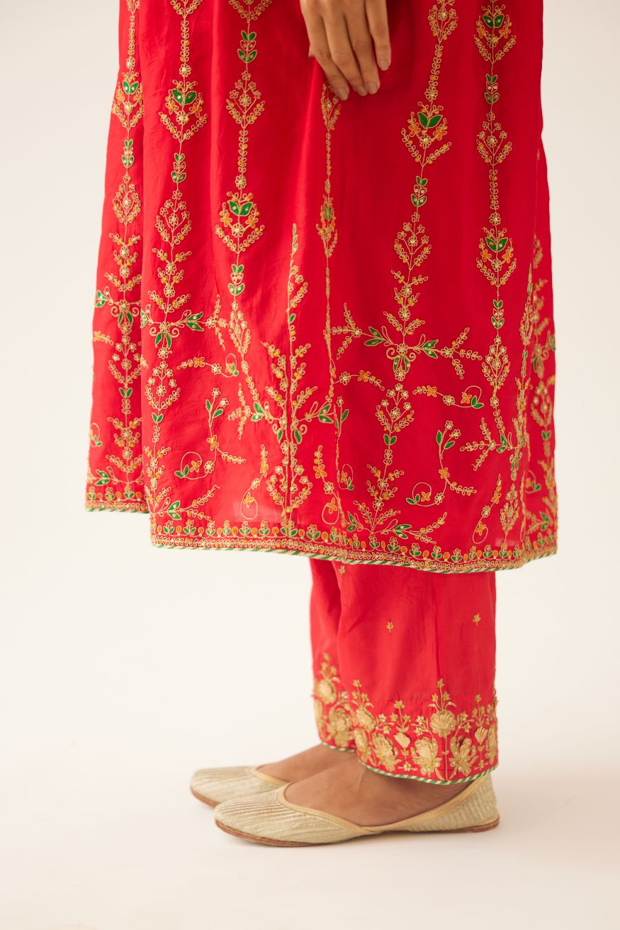 Red silk embroidered kurta dress set with fine gathers at empire line.