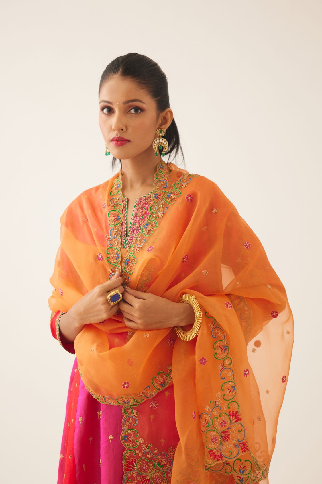 Red & fuchsia silk short kalidar kurta set with all over dori & silk thread embroidery, highlighted with contrast bead & sequins work.