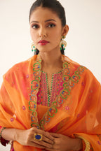 Red & fuchsia silk short kalidar kurta set with all over dori & silk thread embroidery, highlighted with contrast bead & sequins work.
