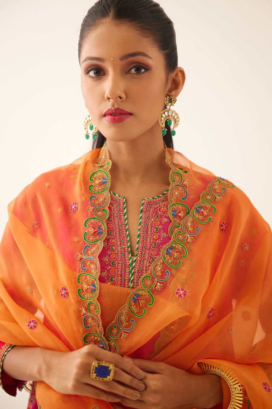 Red & fuchsia silk short kalidar kurta set with all over dori & silk thread embroidery, highlighted with contrast bead & sequins work.