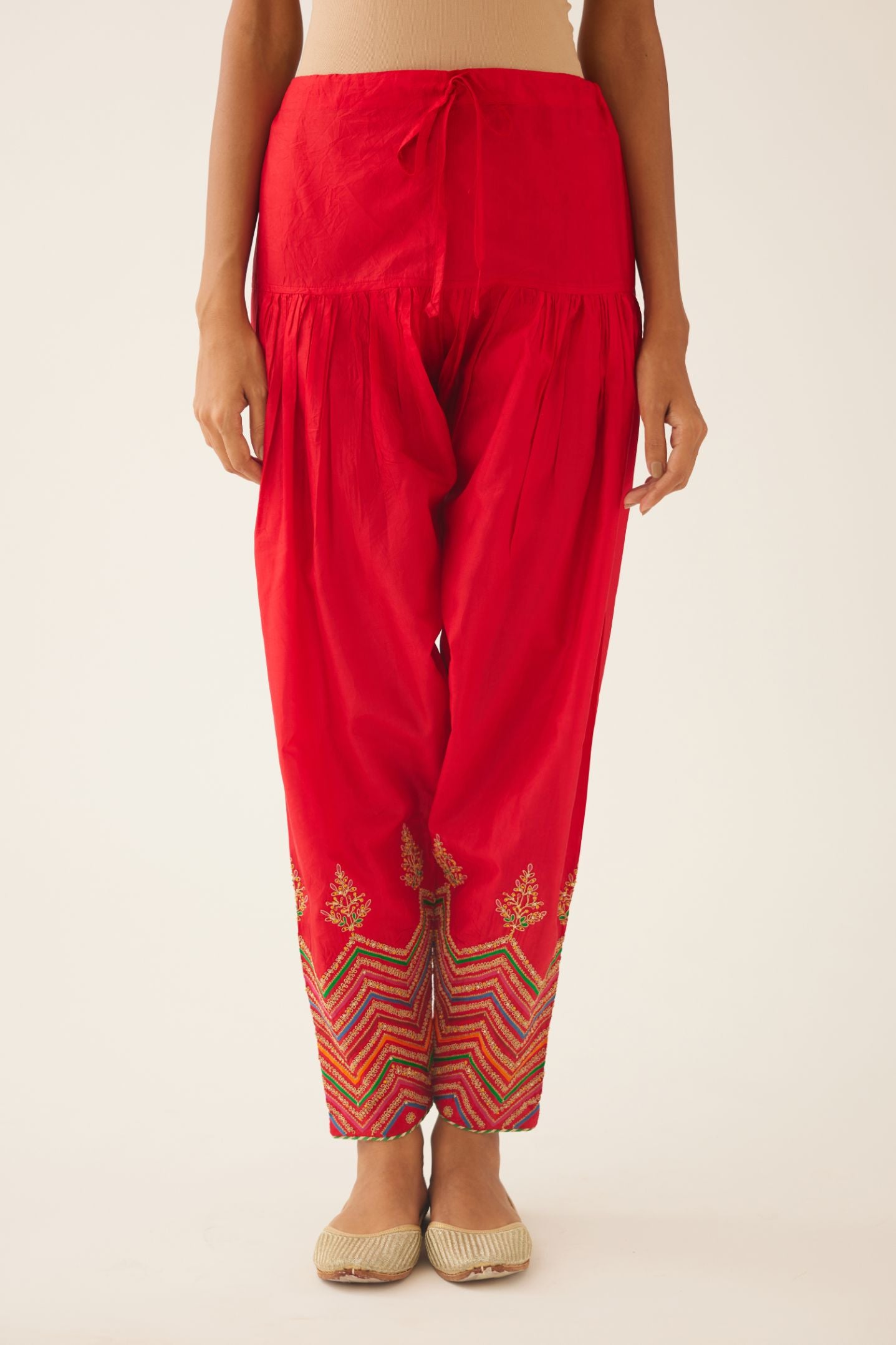 Red silk salwar detailed with dori, silk thread, bead & sequins embroidery.