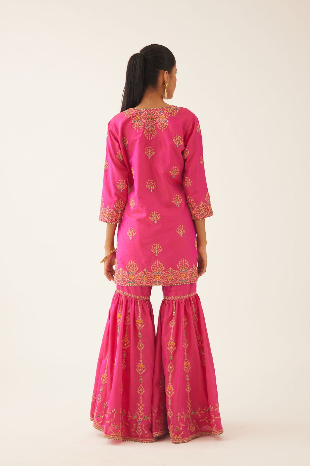 Raspberry silk short kurta set, with dori & silk thread embroidery highlighted with contrast bead & sequins work.