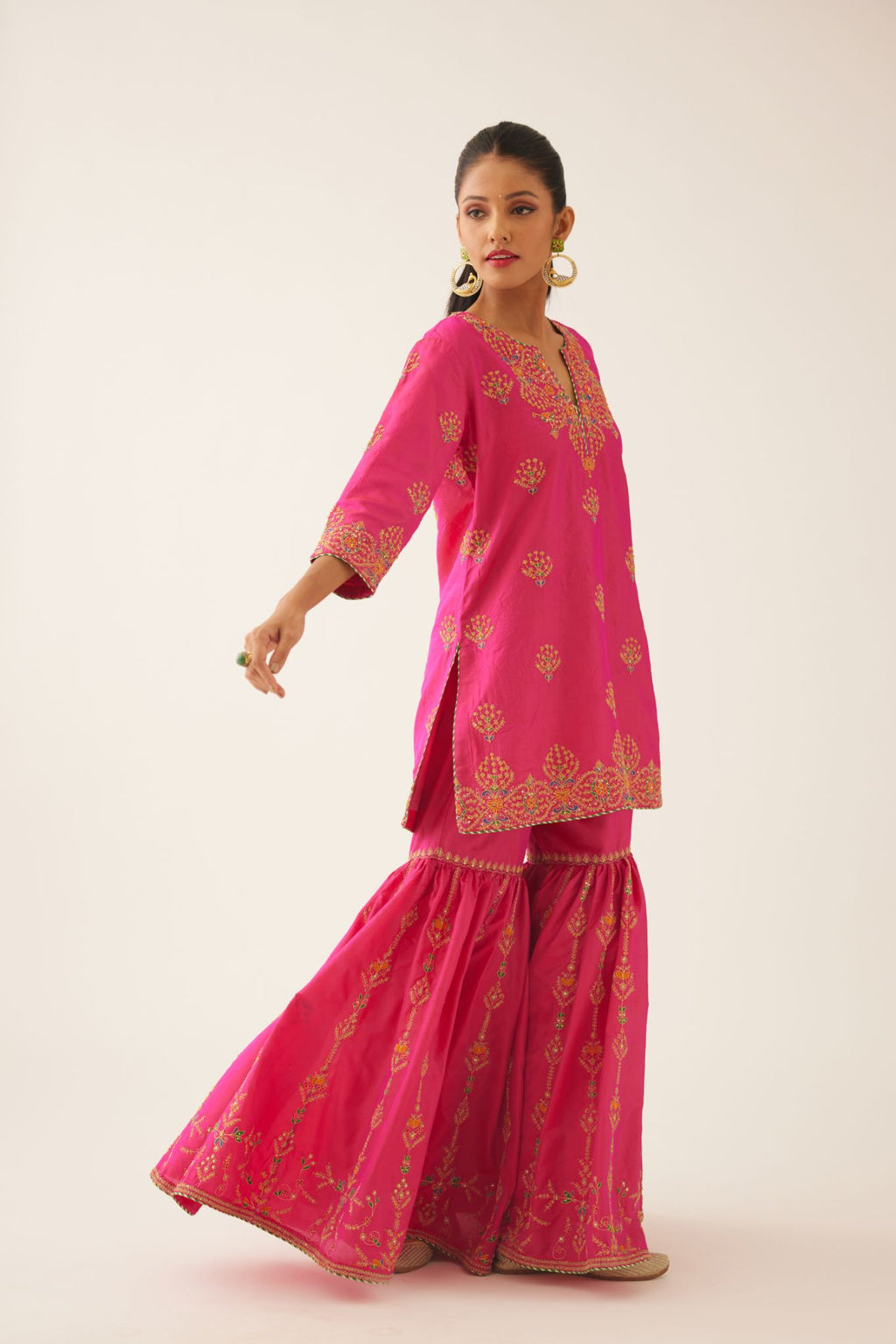Raspberry silk short kurta set, with dori & silk thread embroidery highlighted with contrast bead & sequins work.