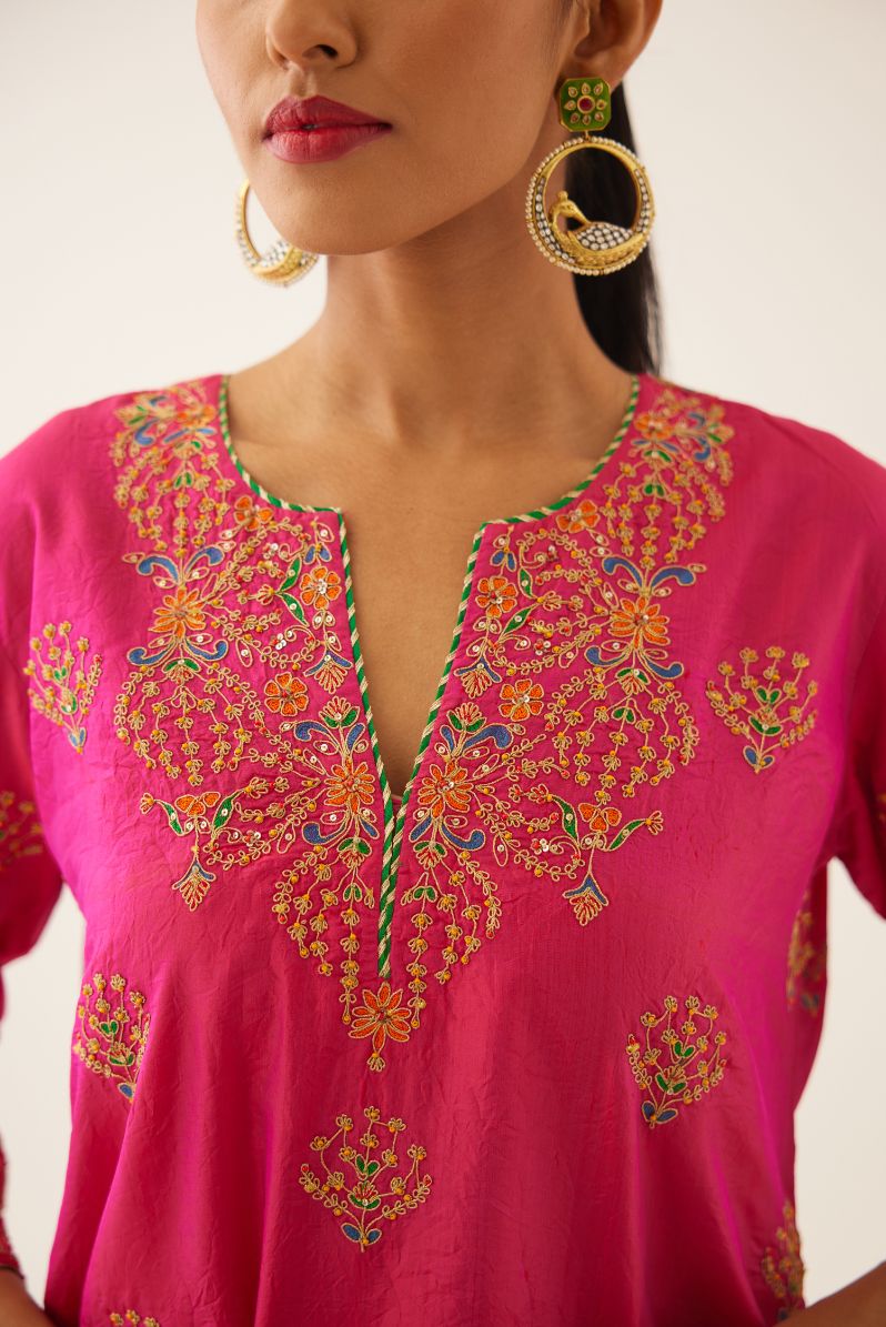 Raspberry silk short kurta set, with dori & silk thread embroidery highlighted with contrast bead & sequins work.
