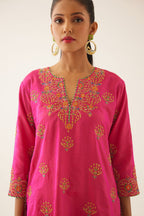Raspberry silk short kurta set, with dori & silk thread embroidery highlighted with contrast bead & sequins work.
