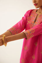 Raspberry silk short kurta set, with dori & silk thread embroidery highlighted with contrast bead & sequins work.