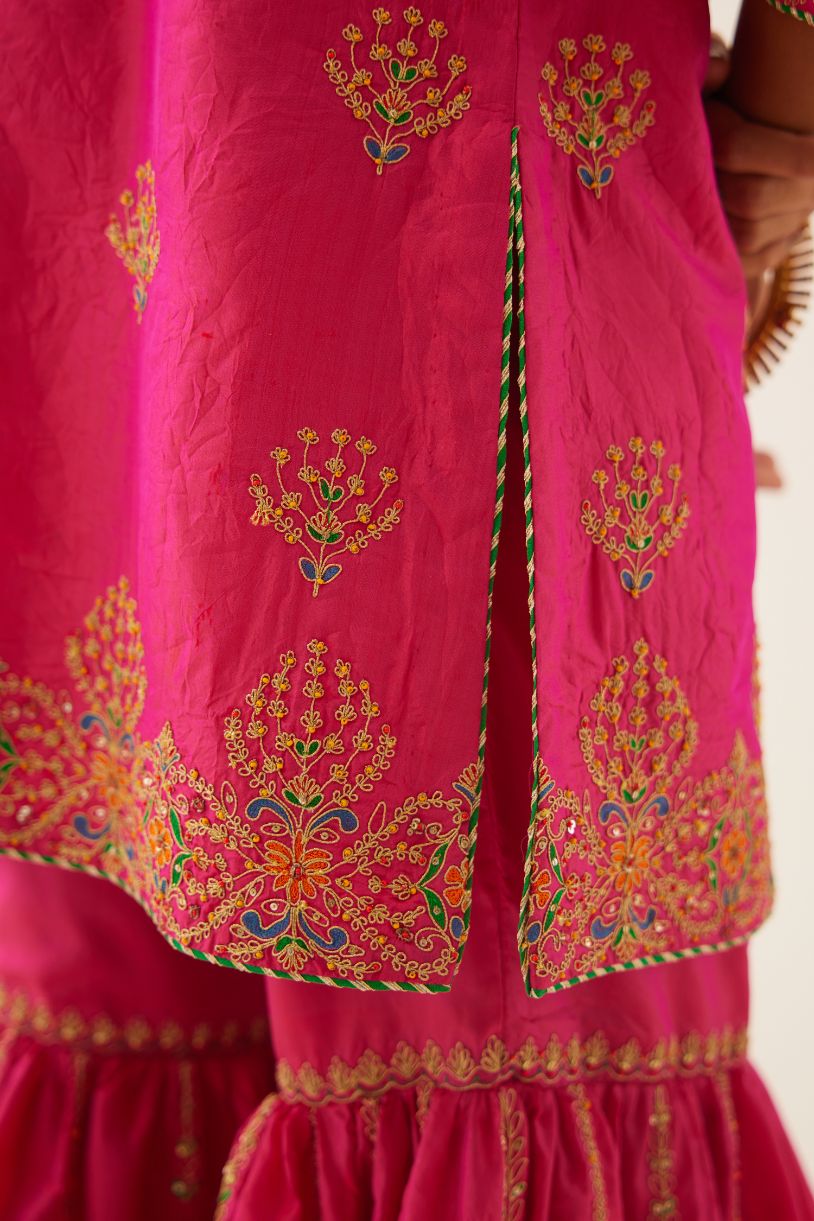 Raspberry silk short kurta set, with dori & silk thread embroidery highlighted with contrast bead & sequins work.
