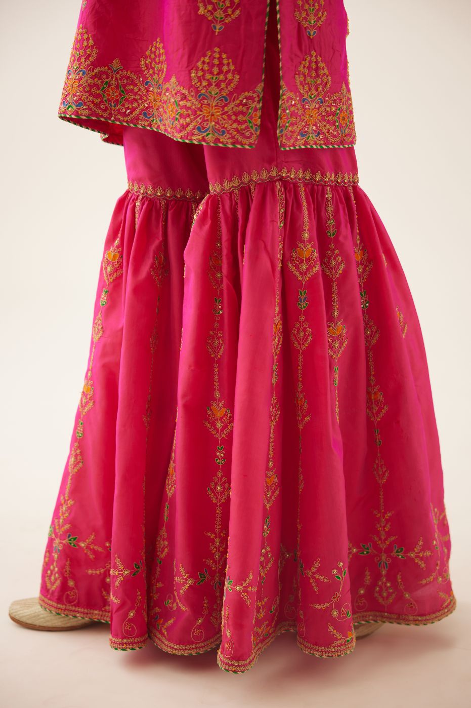 Raspberry silk short kurta set, with dori & silk thread embroidery highlighted with contrast bead & sequins work.