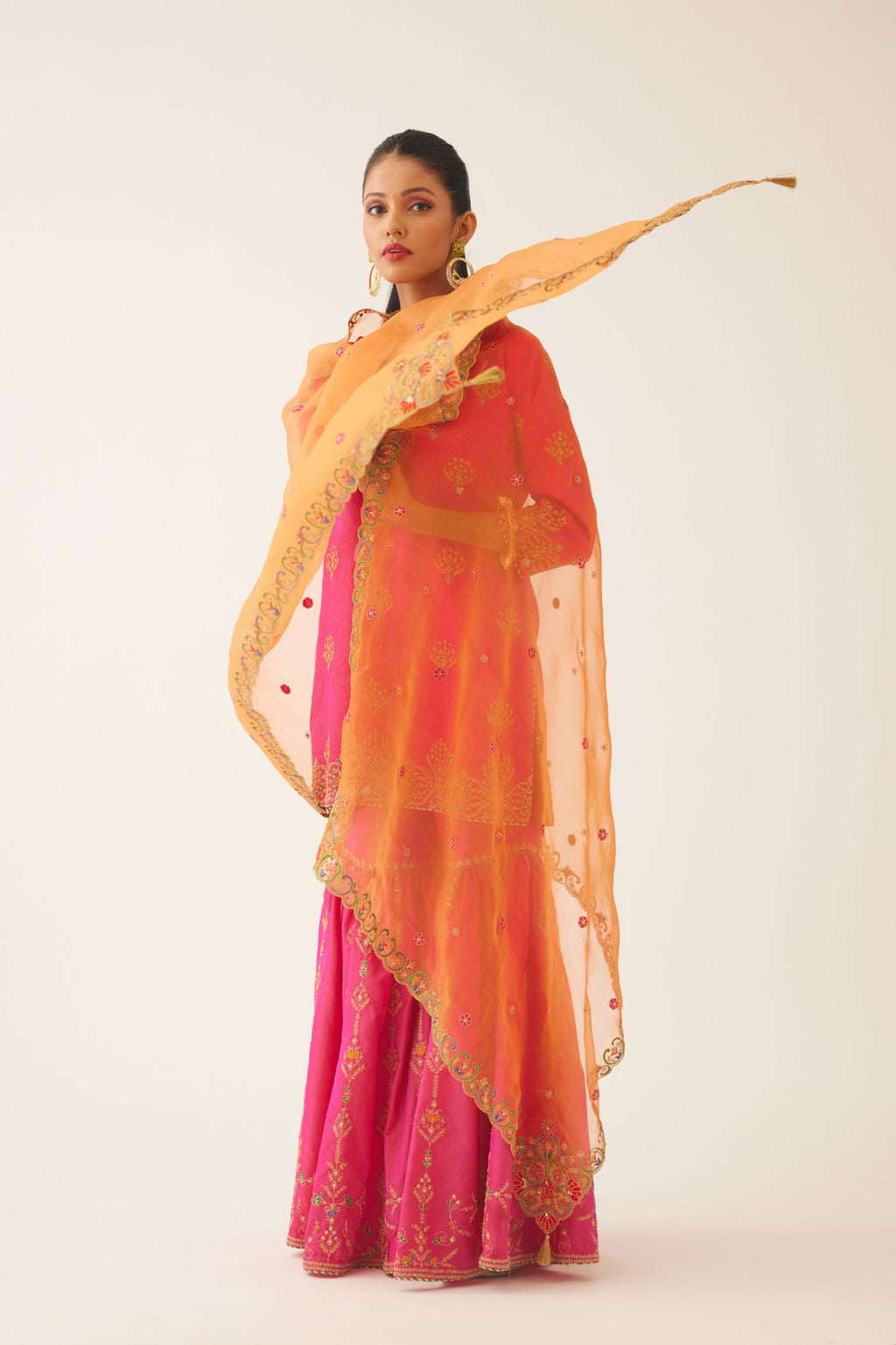 Raspberry silk short kurta set, with dori & silk thread embroidery highlighted with contrast bead & sequins work.