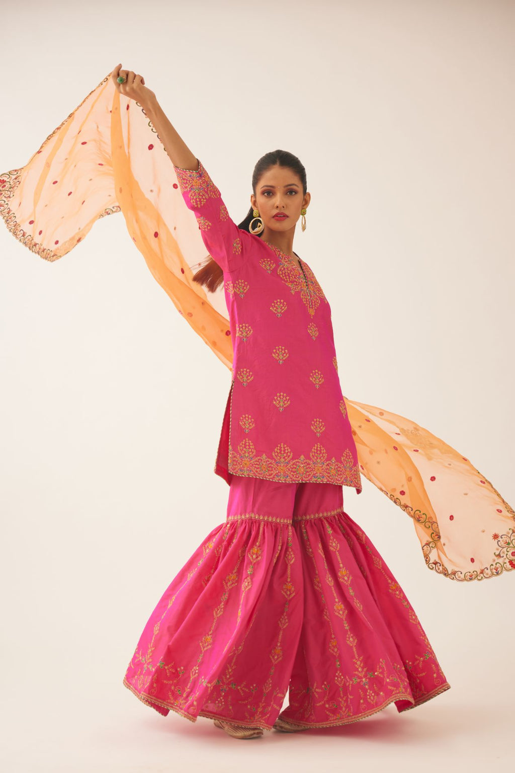 Raspberry silk short kurta set, with dori & silk thread embroidery highlighted with contrast bead & sequins work.