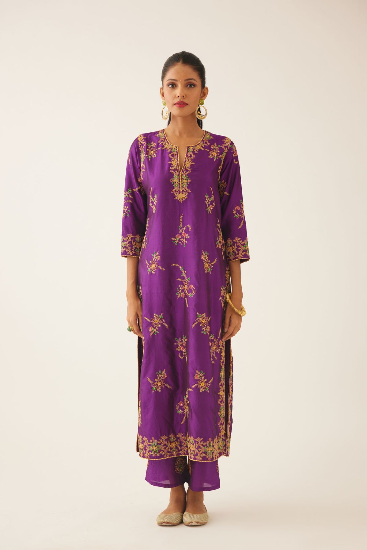Plum purple straight silk kurta set with all over dori & silk thread embroidery highlighted with contrast bead & sequins work.