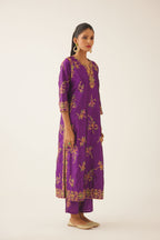 Plum purple straight silk kurta set with all over dori & silk thread embroidery highlighted with contrast bead & sequins work.