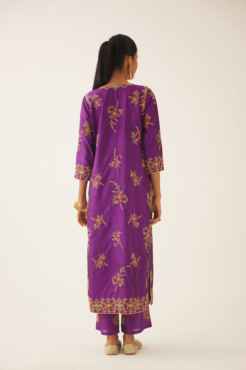 Plum purple straight silk kurta set with all over dori & silk thread embroidery highlighted with contrast bead & sequins work.