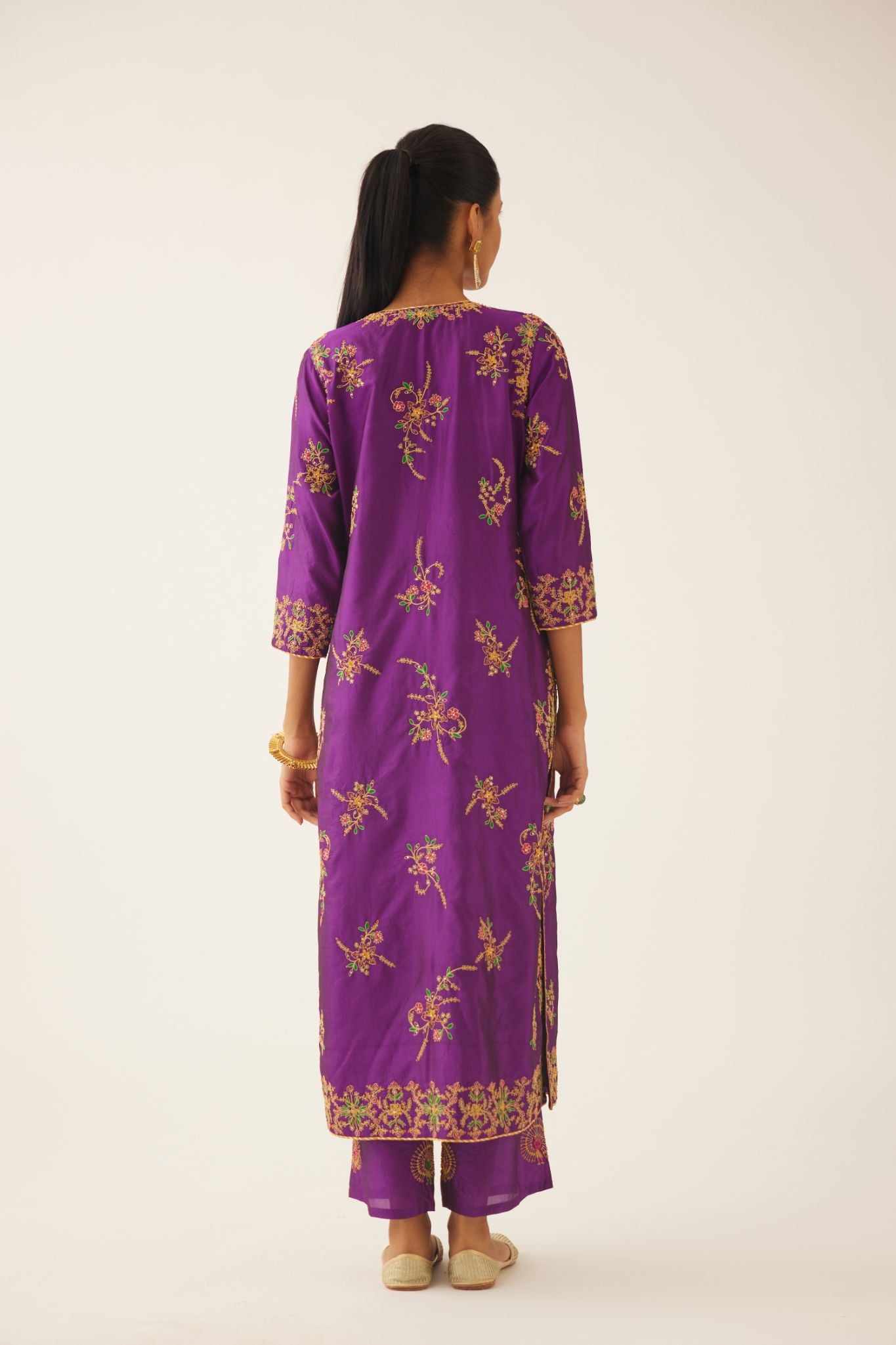 Plum purple straight silk kurta set with all over dori & silk thread embroidery highlighted with contrast bead & sequins work.