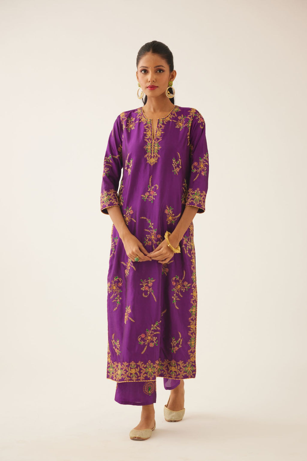 Plum purple straight silk kurta set with all over dori & silk thread embroidery highlighted with contrast bead & sequins work.