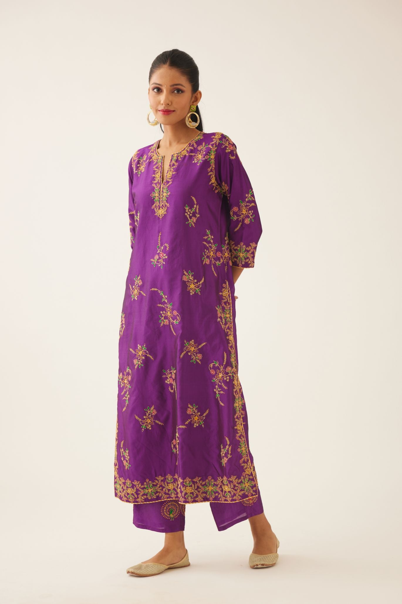 Plum purple straight silk kurta set with all over dori & silk thread embroidery highlighted with contrast bead & sequins work.