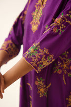 Plum purple straight silk kurta set with all over dori & silk thread embroidery highlighted with contrast bead & sequins work.