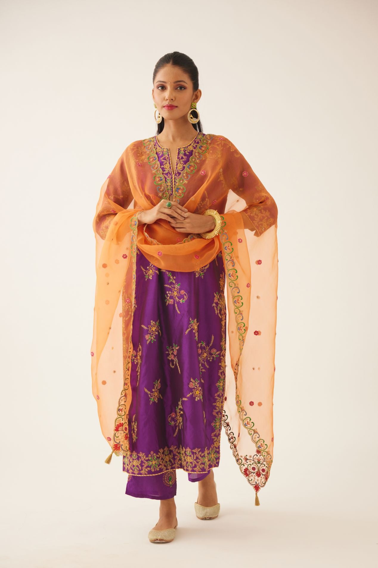 Plum purple straight silk kurta set with all over dori & silk thread embroidery highlighted with contrast bead & sequins work.